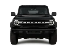 a black truck with white lights